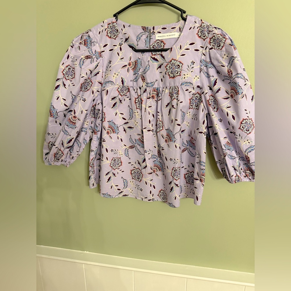 Rebecca Minkoff babydoll pullover top. Purple with floral print. Size XS.